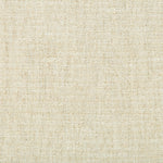 Close-up of beige woven fabric with tight, textured pattern.
