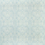 Symmetrical, intricate pattern in blue shades with petal-like motifs.