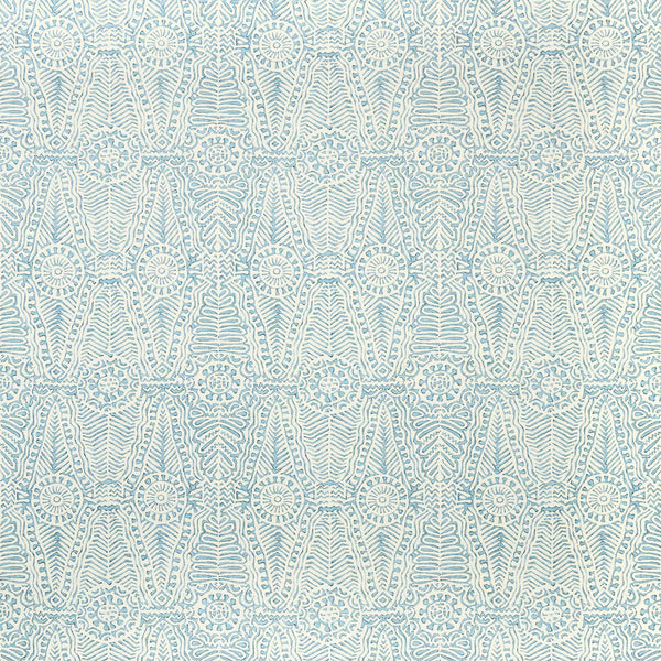 Symmetrical, intricate pattern in blue shades with petal-like motifs.
