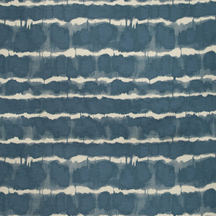 Abstract hand-dyed fabric with alternating blue and white stripes.