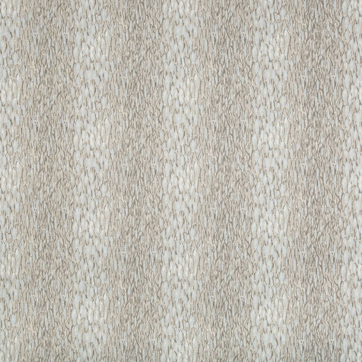 Close-up of a textured fabric with irregular oval patterns.