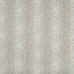 Close-up of a textured fabric with irregular oval patterns.