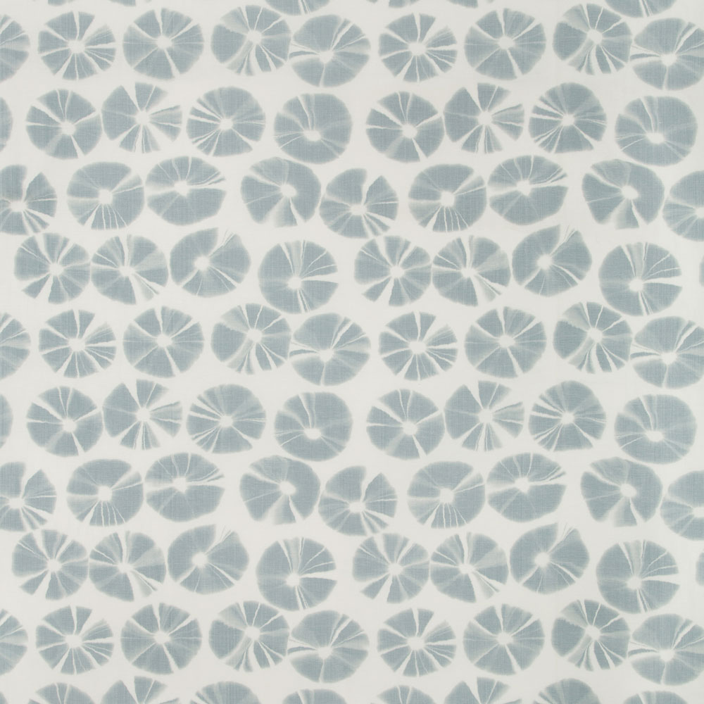 Stylish blue floral fabric pattern with abstract motifs on white.