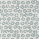 Stylish blue floral fabric pattern with abstract motifs on white.