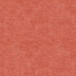 Close-up of a rough, reddish fabric texture with woven look