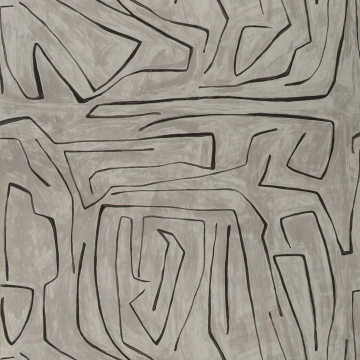 Abstract grayscale artwork featuring interlocking shapes and labyrinthine patterns.