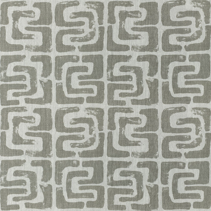 Repeating geometric pattern with interlocking shapes in contrasting colors.