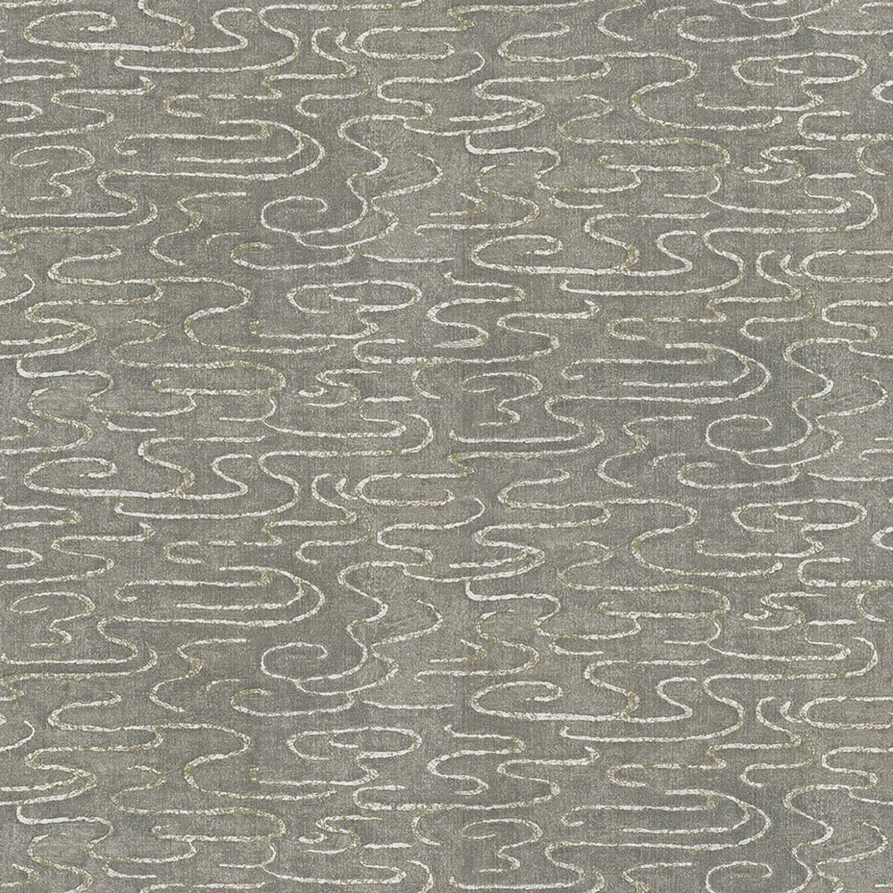 Abstract metallic thread pattern on grey textured fabric background.