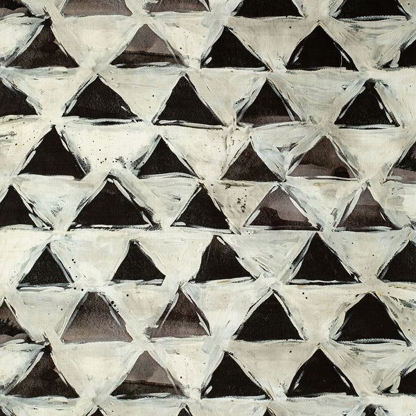 Abstract tessellation artwork featuring interconnected black and white triangles.