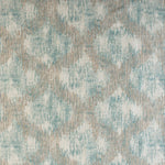 Textured fabric with distressed aqua and beige pattern for home decor.