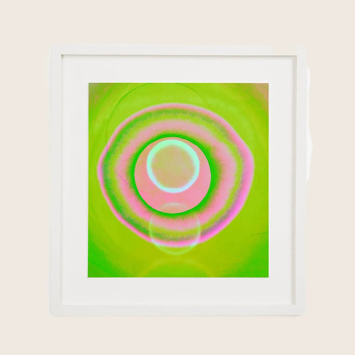 Hypnotic abstract artwork with concentric circles in vibrant colors.