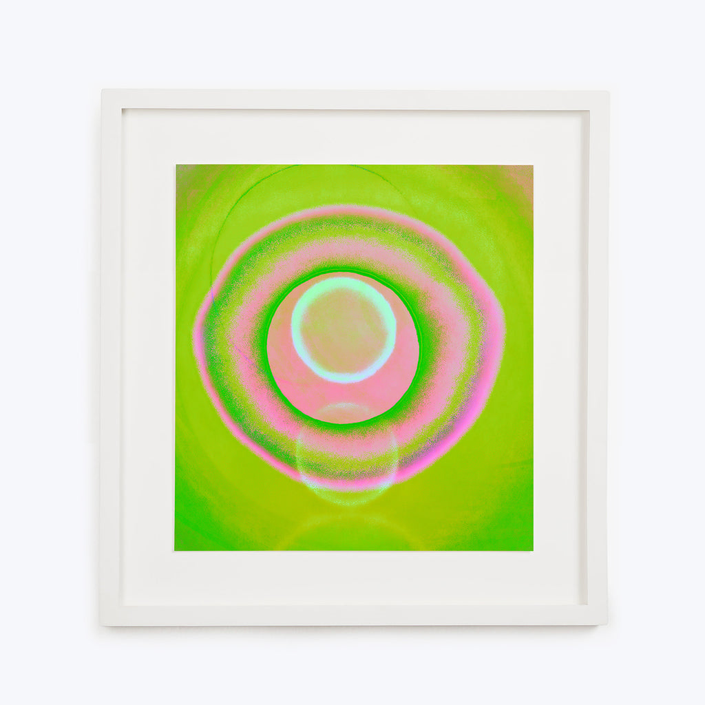 Hypnotic abstract artwork with concentric circles in vibrant colors.