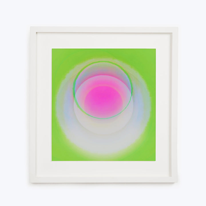 Abstract art piece with soft gradient circles framed and displayed.