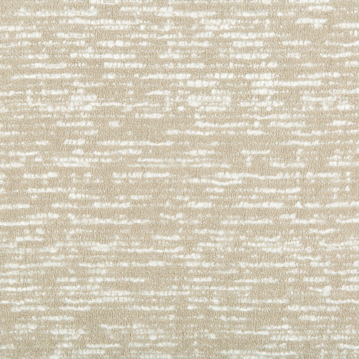 Close-up of textured fabric with woven and printed pattern.