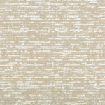 Close-up of textured fabric with woven and printed pattern.