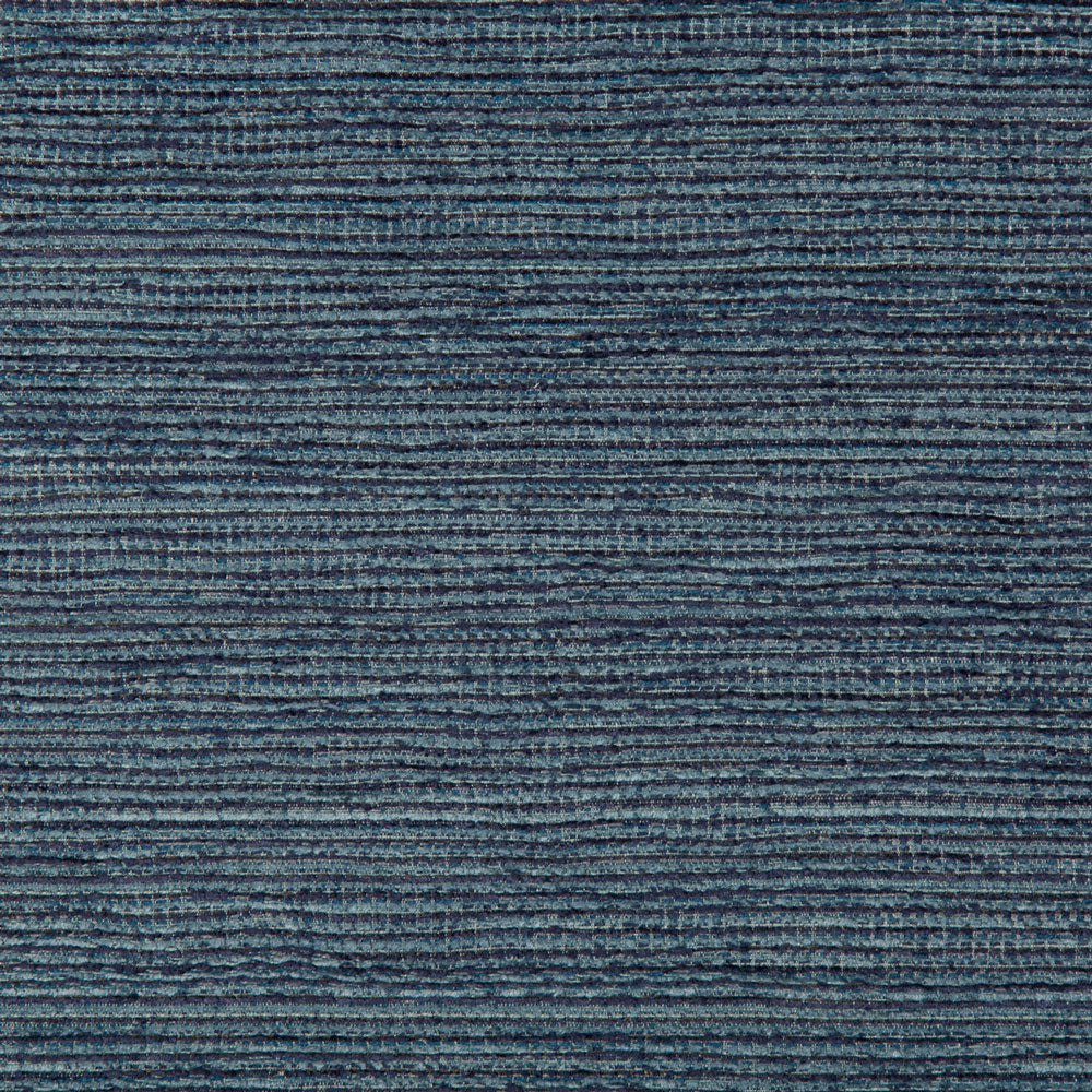 Close-up of denim fabric showcasing its iconic rugged texture.