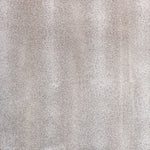 Close-up of a shimmering, textured surface adds a touch of glamour.