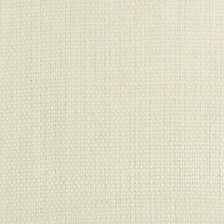 Close-up of a creamy, textured fabric with a fine-grained weave.