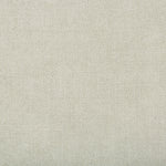 Close-up of a neutral, textured surface highlighting its uniformity.