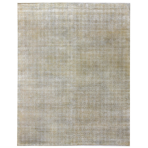 Vintage-inspired rug with muted beige tones and faded geometric pattern.