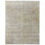 Vintage-inspired rug with muted beige tones and faded geometric pattern.