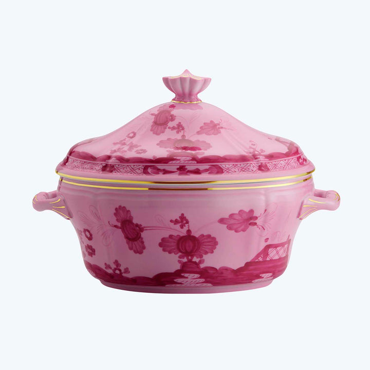 Vibrant pink decorative pot with floral patterns and elegant accents.