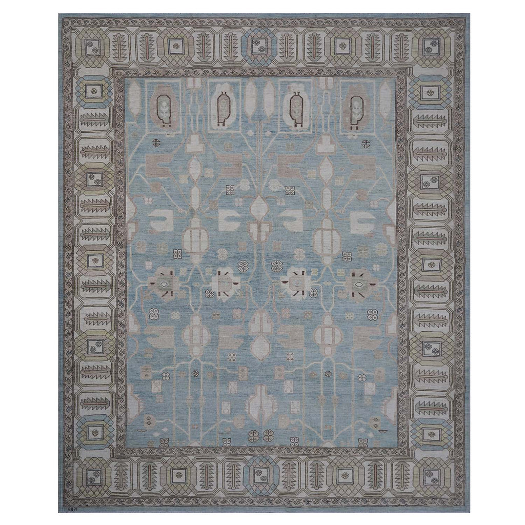 Exquisite symmetrical area rug with intricate patterns and muted tones.
