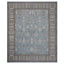 Exquisite symmetrical area rug with intricate patterns and muted tones.