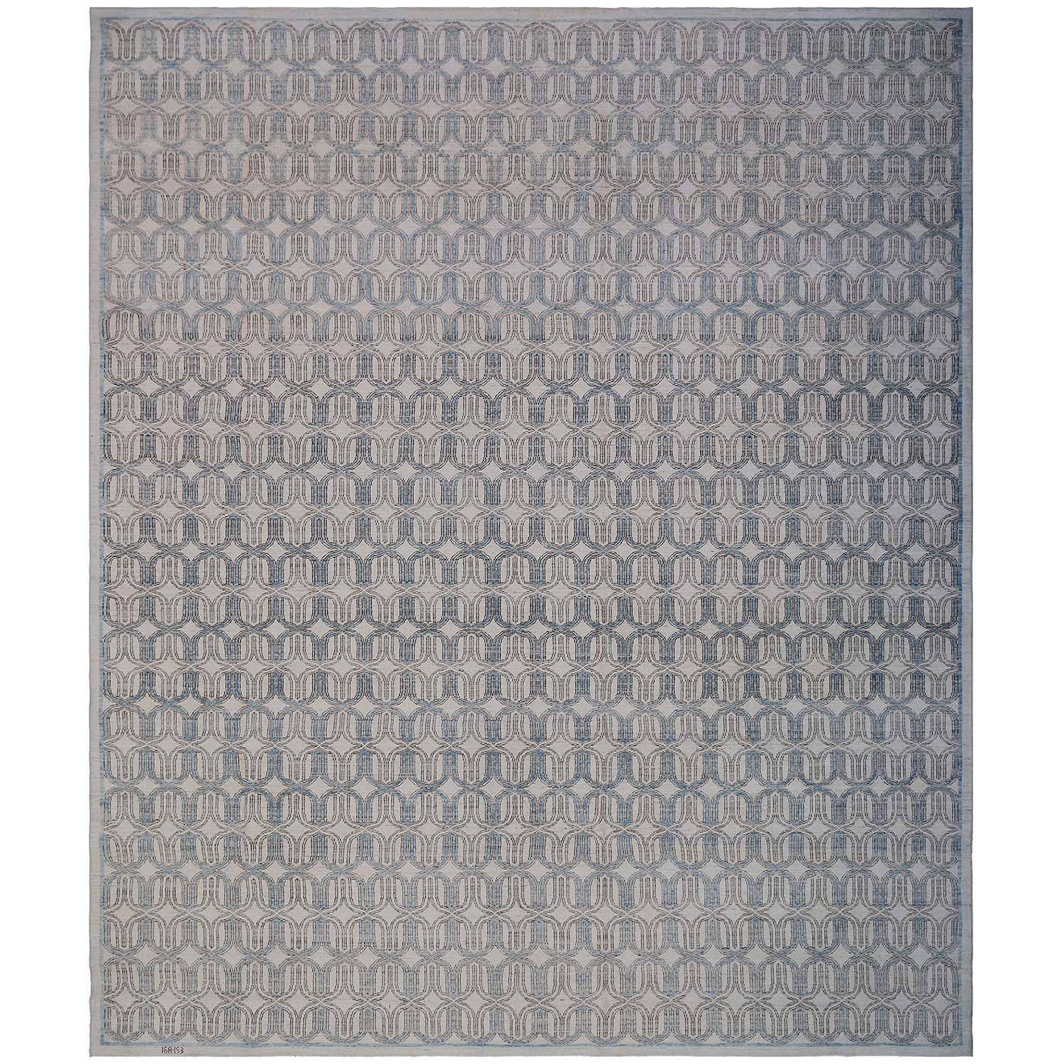 Monochromatic rectangular area rug with interlocking chain-like geometric pattern.