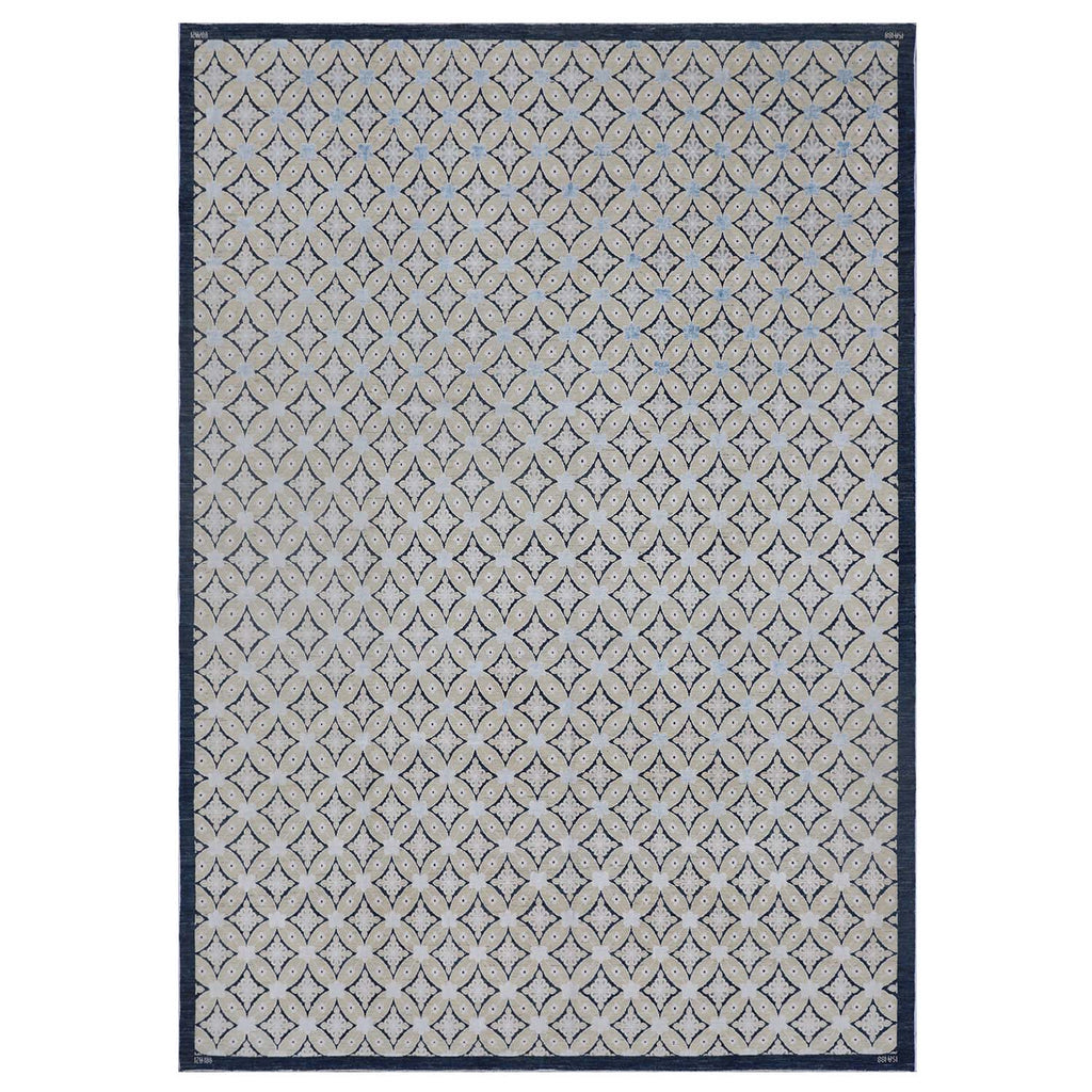 Contemporary rectangular area rug with geometric pattern in neutral colors.