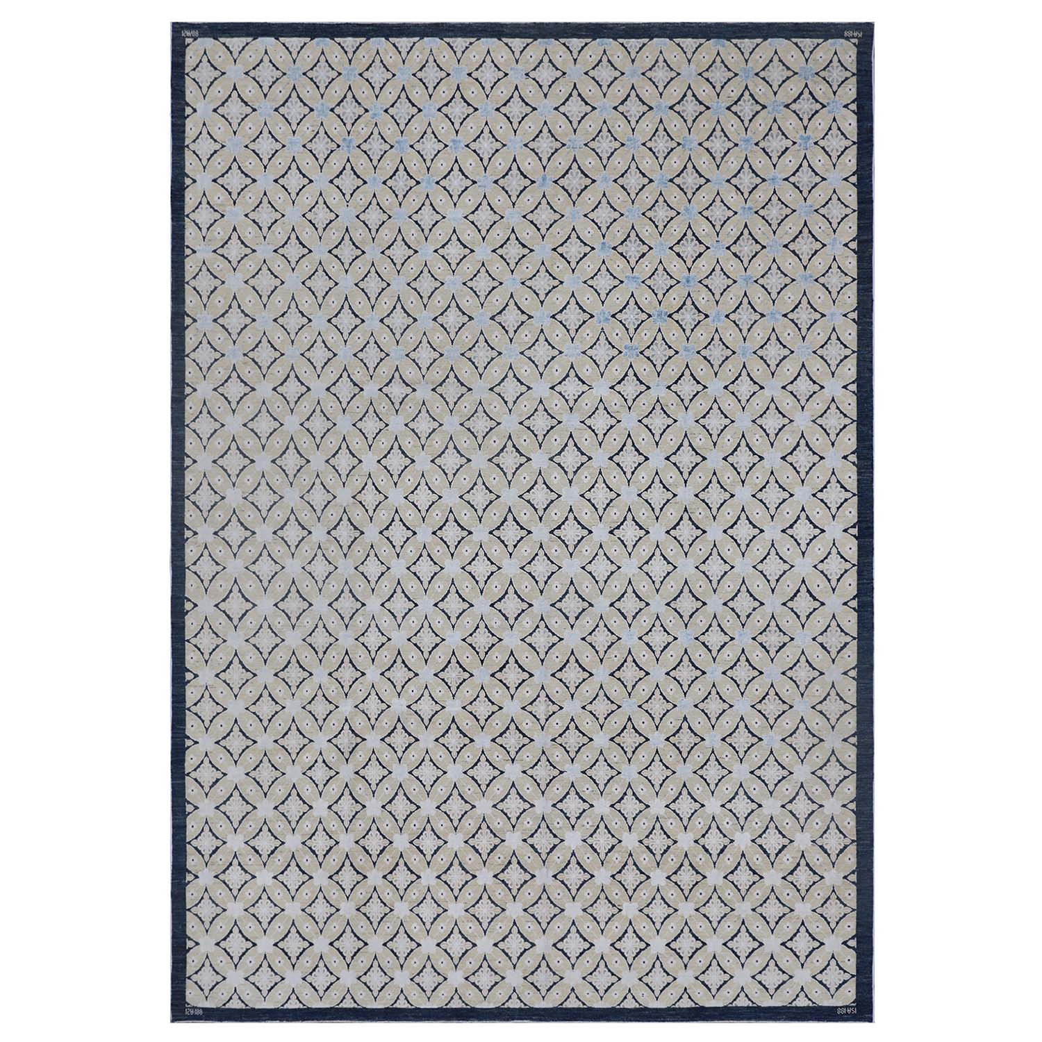 Contemporary rectangular area rug with geometric pattern in neutral colors.