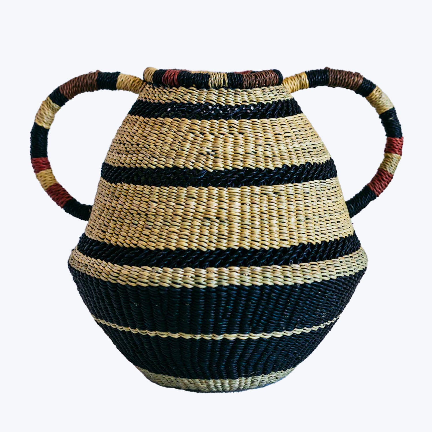 Handcrafted woven basket with precision stripes and decorative handle.