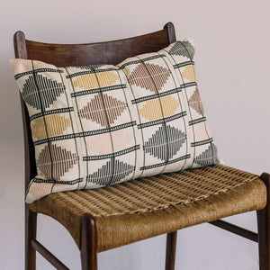 Geometric patterned throw pillow adds modern flair to any space. - hover