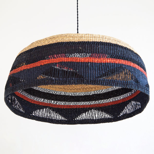 Unique woven pendant light fixture with vibrant blue and red hues.