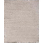 Soft and fluffy rectangular rug in a uniform light color.