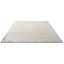 Simple, plain rug with soft texture in uniform light color.