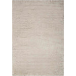 Minimalist and versatile rectangular rug with a plush, textured surface.