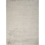 Abstract textured surface in neutral tones with subtle irregularities.