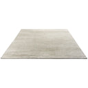 Minimalistic cream area rug with soft texture and clean edges.