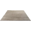 Minimalistic rectangular rug in a gradient shade adds elegance to interiors.