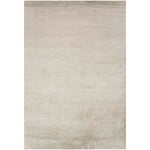 Minimalist cream rug adds texture and warmth to any space.