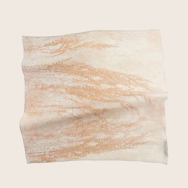 Delicate, lace-like fabric with a soft, organic pattern.