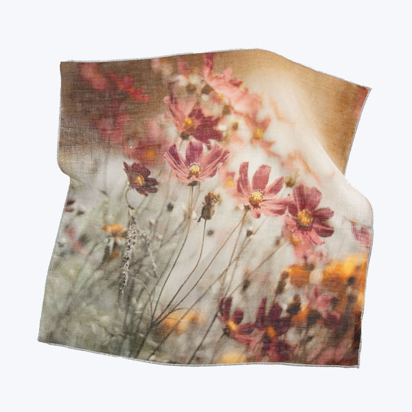 Soft-focus floral fabric with frayed edges adds casual elegance.