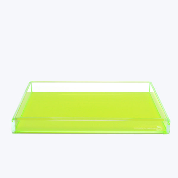 Neon green acrylic tray adds a contemporary touch to any space.