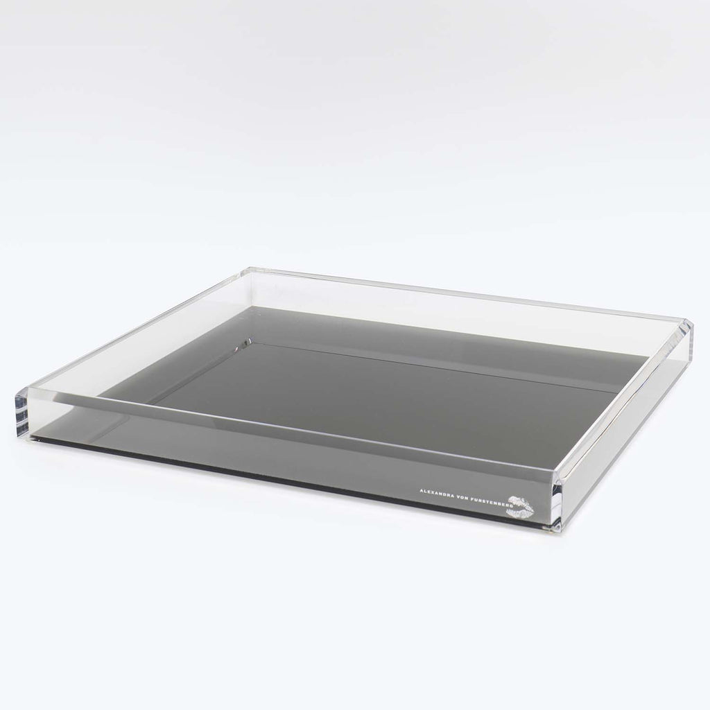 Sleek, modern acrylic tray with raised edges and glossy finish.