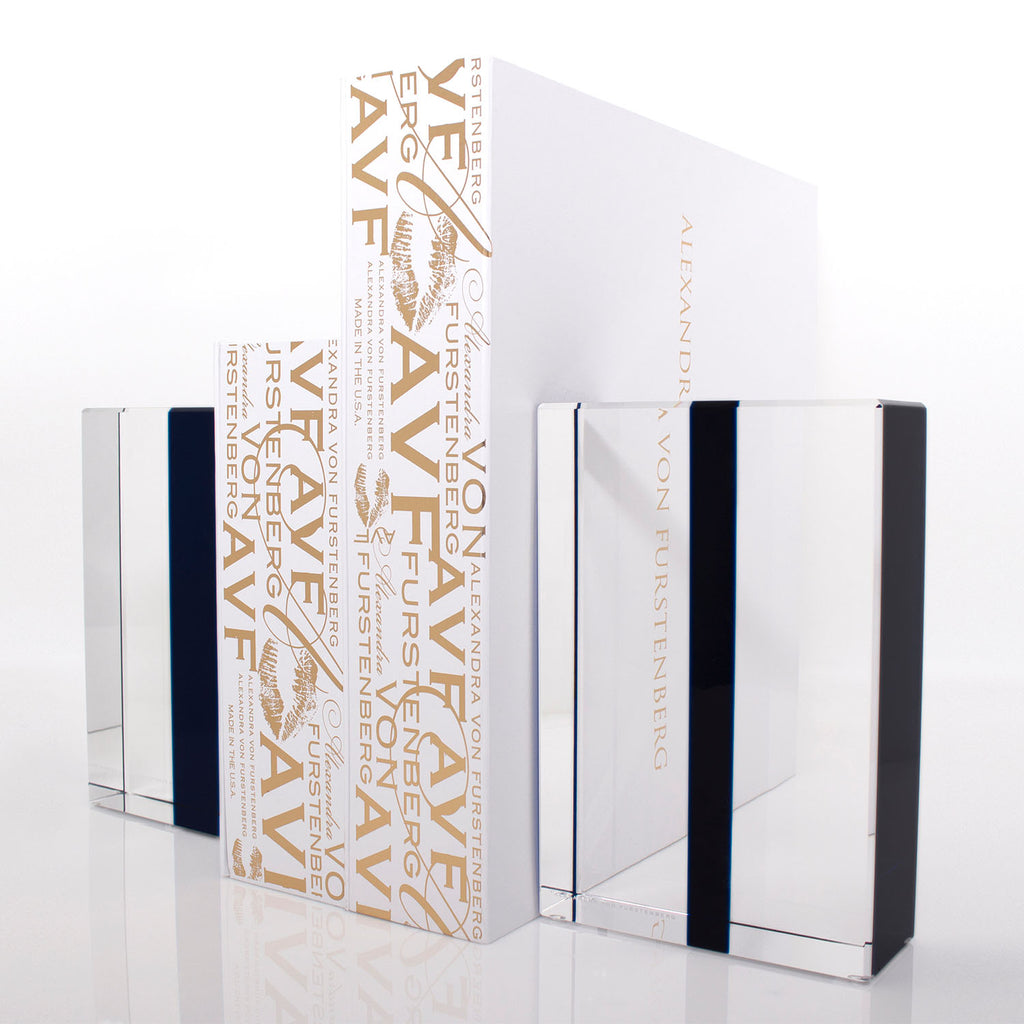 Set of four mirrored books with gold spines by Alexandra Von Furstenberg