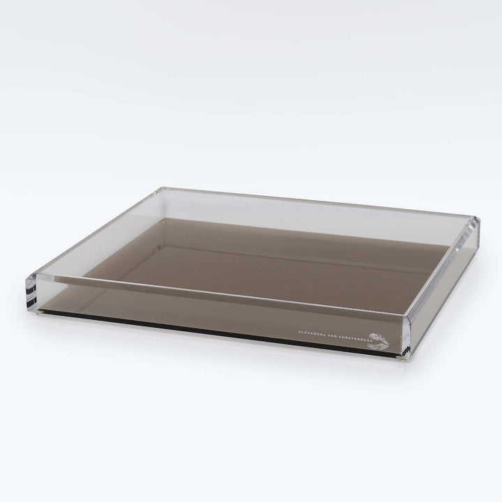 Rectangular tray with reflective surface and 'Alexandra Von Furstenberg' signature.