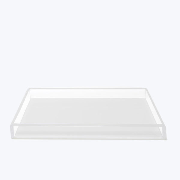 Minimalist rectangular tray with raised edges made of translucent material.