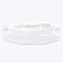 Contemporary transparent ashtray with geometric design, resembling a gemstone.