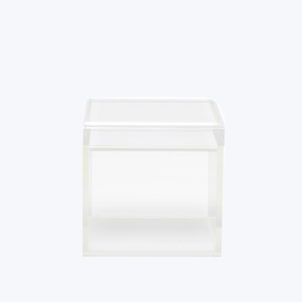 Clear plastic storage box with lid for organizing small items.